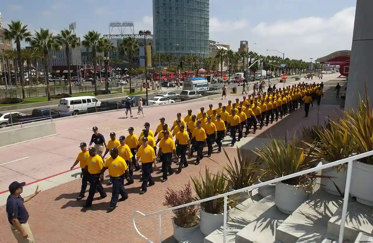 US Navy 040908-N-1995C-429 Chief petty officer (CPO) selectees march through downtown San Diego, Calif., along the Embarcadero as they make there way to the retired aircraft carrier USS Midway (CV 41)