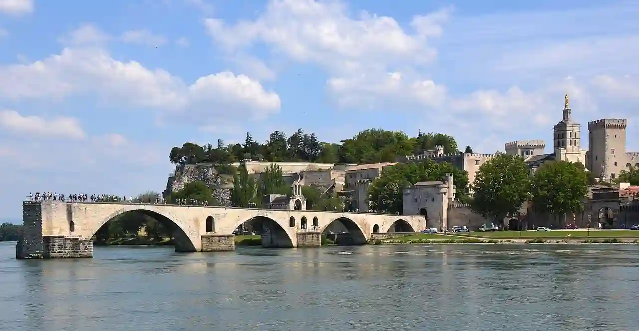 "Sur le Pont d'Avignon on y danse" is the famous song, but now we see only many tourist just standing there - panoramio